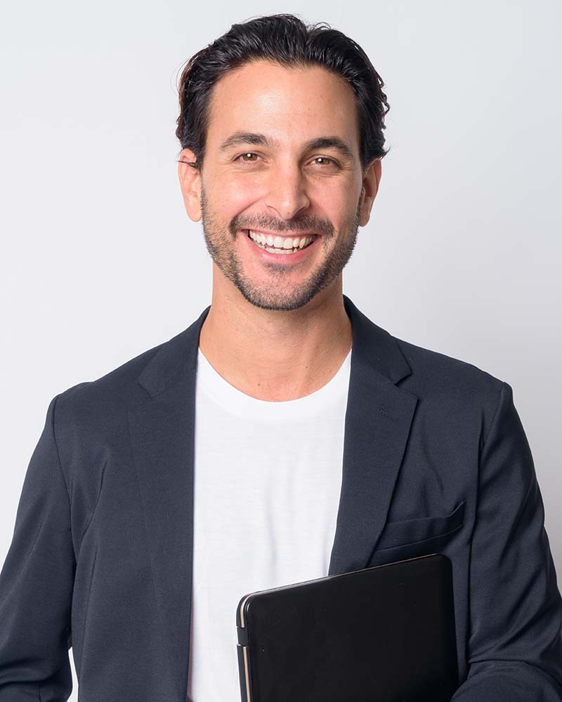 portrait-of-happy-handsome-hispanic-businessman