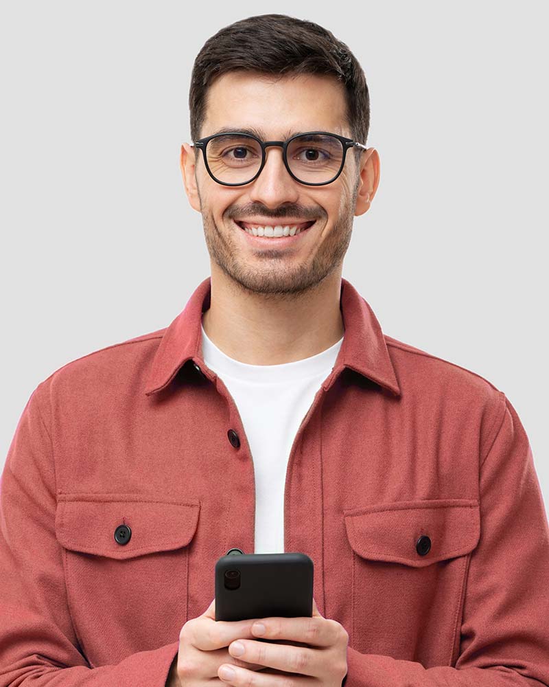 young-modern-man-holding-smart-phone-in-hands